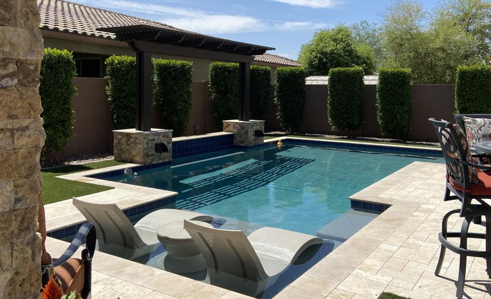 Custom pool and outdoor living space built by Saturn Pool Company in Arizona